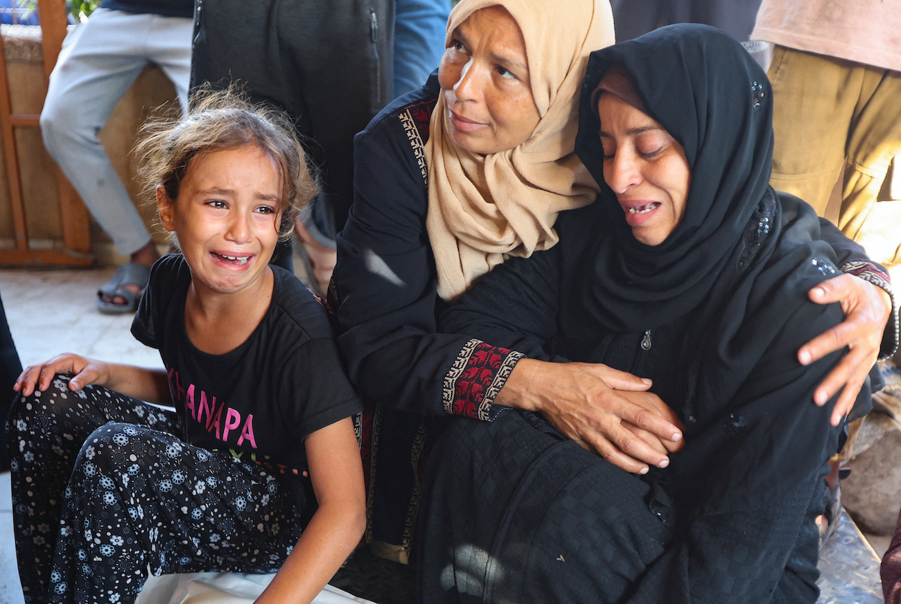 Mourners react at the funeral of Palestinians killed in an Israeli strike on Saturday, according to medics, at Nasser Hospital in Khan Younis, southern Gaza Strip, October 5, 2025. (Reuters)