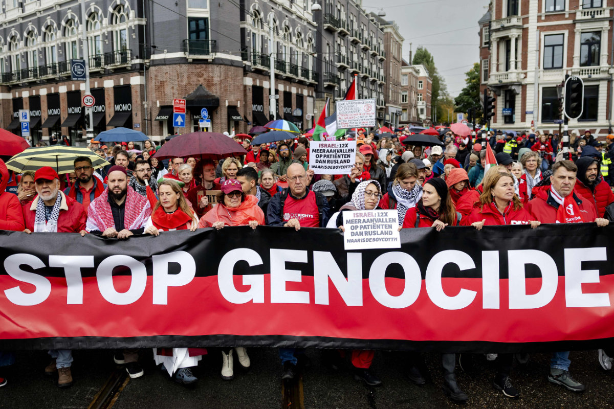 Demonstrators take part in a "Red Line" protest in Amsterdam, the Netherlands, on October 5, 2025, demanding "government action to stop the genocide in Gaza". (ANP via AFP)
