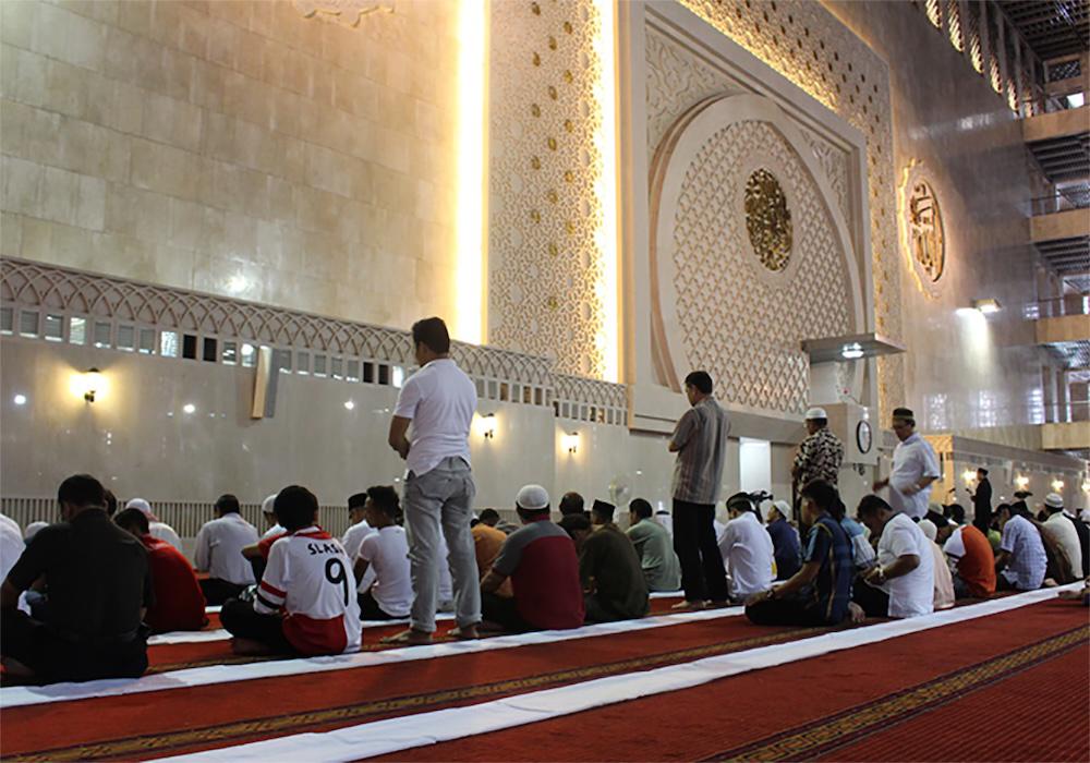 No one was injured in Saturday’s blaze in the seaside town of Peacehaven, which damaged the mosque’s front entrance and a vehicle parked outside. Above, worshipers inside the mosque. (peacehavenmosque.co.uk)