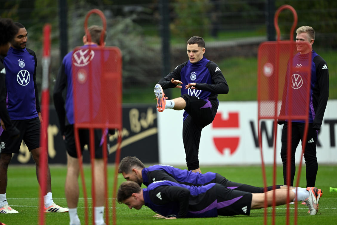 Germany’s Florian Wirtz, center, lifts a leg during training session of the German national team in Herzogenaurach, Germany, Oct. 7, 2025, ahead of their World Cup qualifier match against Luxembourg. (AP)
