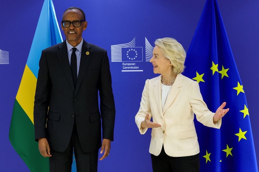 European Commission President Ursula von der Leyen greets Rwandan President Paul Kagame on Thursday in Brussels, Belgium. (Reuters)