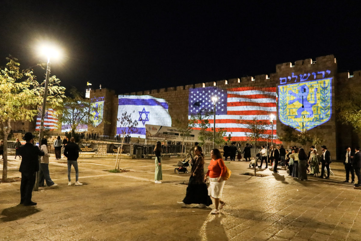 United States and Israel flags are projected on the walls of the Old city of Jerusalem on October 9, 2025, in celebration after Israel and Hamas agreed to the first phase of US President Donald Trump's plan to end the war in Gaza. (REUTERS)
