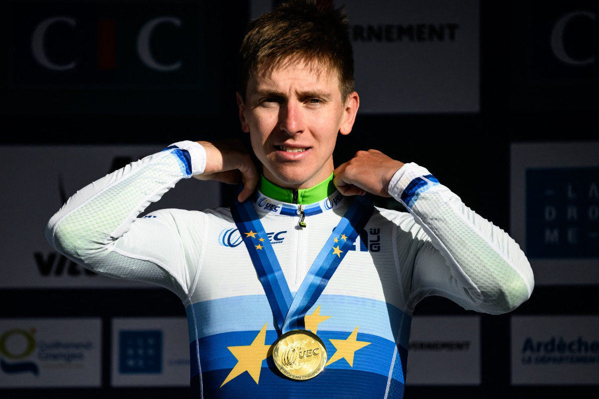 Slovenian rider Tadej Pogacar celebrates in the podium after winning the men's Elite Road Race at the European Cycling Championship 2025 near Valence, southeastern France on Oct. 5, 2025. (File/AFP)