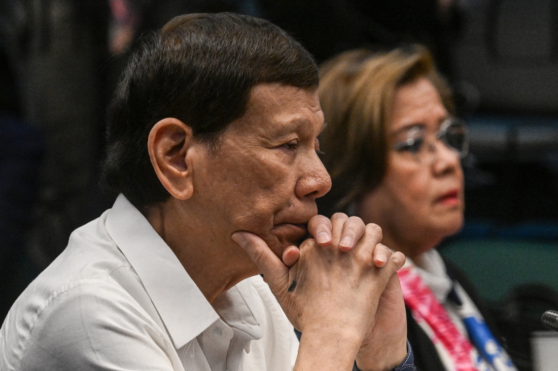 Former Philippine president Rodrigo Duterte and former senator and human rights campaigner Leila de Lima attend a senate probe on the drug war during Duterte's administration, in Manila in 2024. (AFP)
