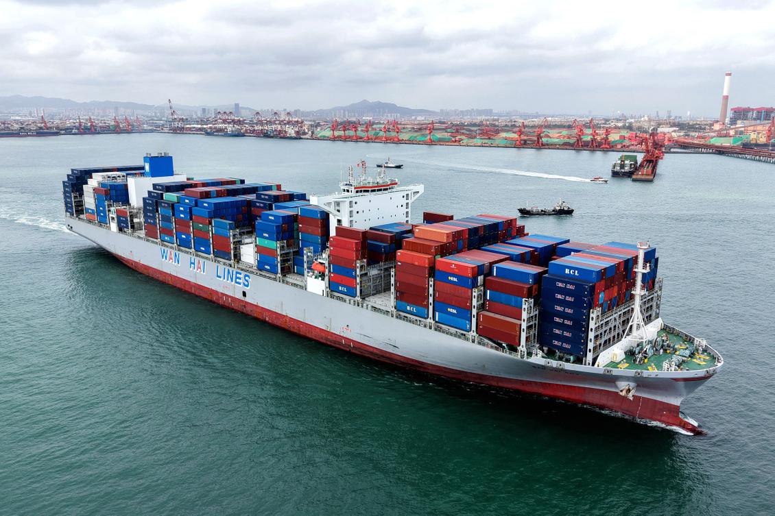 Above, a container ship sails at the port in Qingdao, in China’s eastern Shandong province on Oct. 9, 2025. President Donald Trump has raised taxes on imports from many US trading partners this year, seeking to win concessions in return for tariff reductions. (AFP)