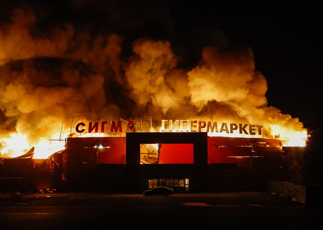 Above, the Sigma shopping mall is on fire after it was hit by a Ukrainian military strike in Donetsk, a Russian-controlled city of Ukraine on Oct. 11, 2025. (Reuters)