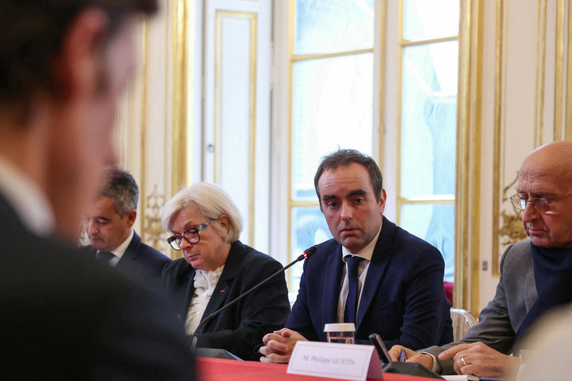 France’s reappointed Prime Minister Sebastien Lecornu, center, delivers a speech during a meeting with the newly-appointed members of his cabinet in Paris on Oct. 13, 2025. (Reuters)