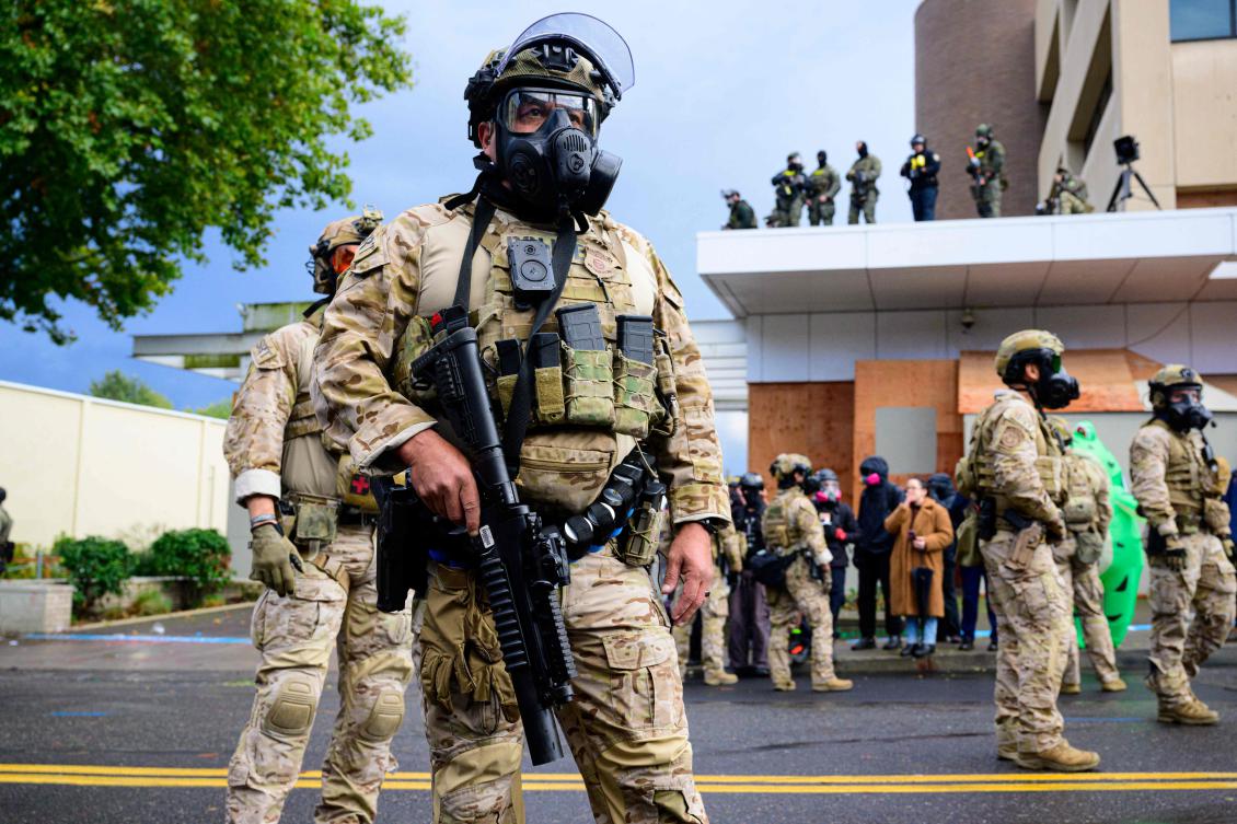 Above, federal agents clash with anti-ICE protesters at the US Immigration and Customs Enforcement building on Oct. 12, 2025 in Portland, Oregon. (Getty Images/AFP)