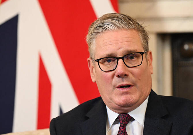 Britain could take a leading role in helping to disarm Hamas in Gaza, based on its experience of encouraging militant groups in Northern Ireland to lay down their arms, Prime Minister Keir Starmer said on Tuesday. (AFP/File)