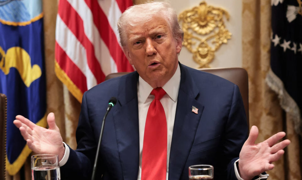 US President Donald Trump gestures as he speaks during lunch with Argentina’s President Javier Milei (not pictured) in the Cabinet Room at the White House in Washington, DC, US, October 14, 2025. (Reuters)