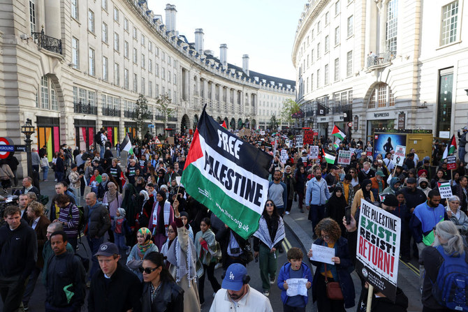 Demonstrators protest in solidarity with Palestinians, amid the ongoing conflict between Israel and the Palestinian Islamist group Hamas, in London. (Reuters)