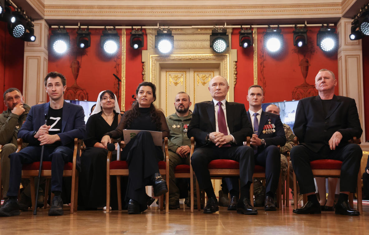 Russian President Vladimir Putin meets with Russian journalists who work in the zone of the special military operation in Ukraine at the 20th anniversary celebration of Russia Today at the Bolshoi Theatre in Moscow, Russia, Friday, Oct. 17, 2025. (AP)
