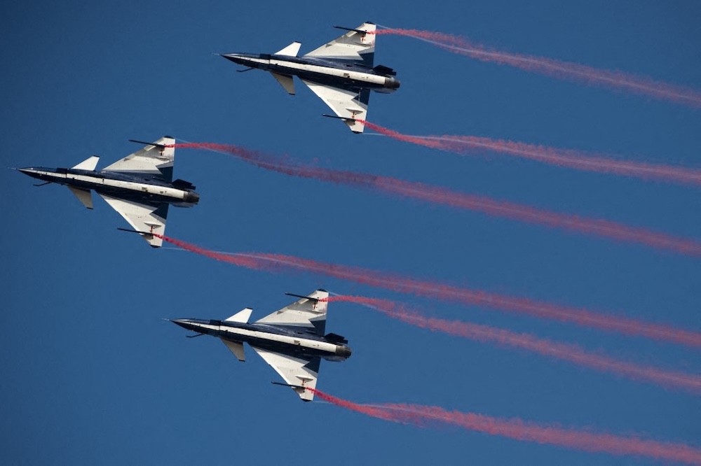 Above, three Chinese J-10 aircraft from stay in close formation during the combined exercise ‘Falcon Strike 2015’ in Korat, Thailand on Nov. 24, 2015. (AFP)