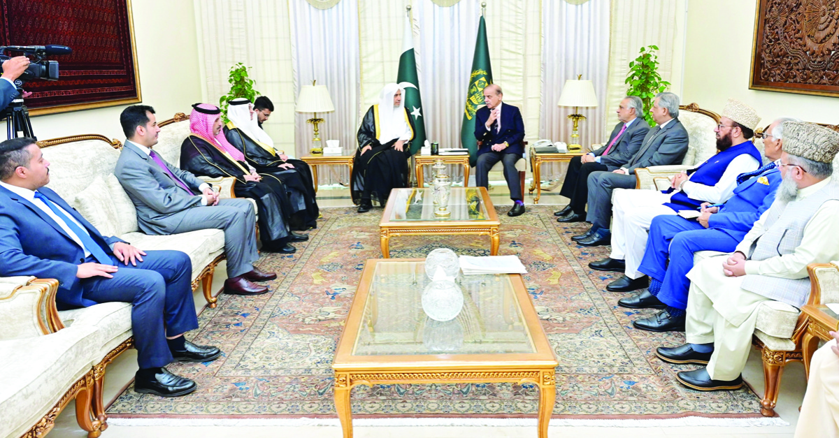 Dr. Mohammed bin Abdulkarim Al-Issa (L) and Shehbaz Sharif in Islamabad. (Supplied)
