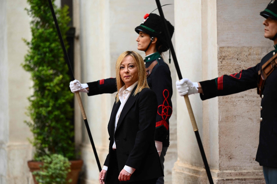 Italy's prime minister, Giorgia Meloni arrives for a handover ceremony at Palazzo Chigi in Rome on October 23, 2022. (AFP)