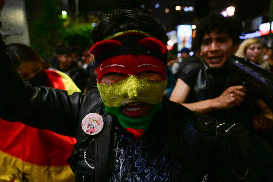 A demonstrator shouts "fraud" during a protest against president-elect Rodrigo Paz following the results of the run-off presidential election in La Paz, Bolivia. (AFP)
