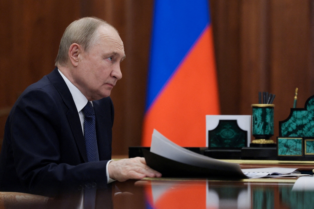 Russian President Vladimir Putin attends a meeting with Ulyanovsk Region Governor Alexei Russkikh at the Kremlin in Moscow, Russia. (Reuters)