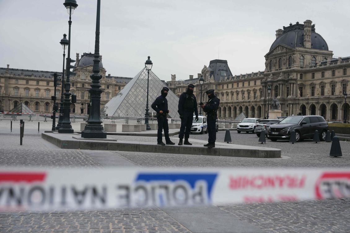 French police officers patrol in front of the Louvre Museum after it was robbed on Oct. 19, 2025. (AFP)