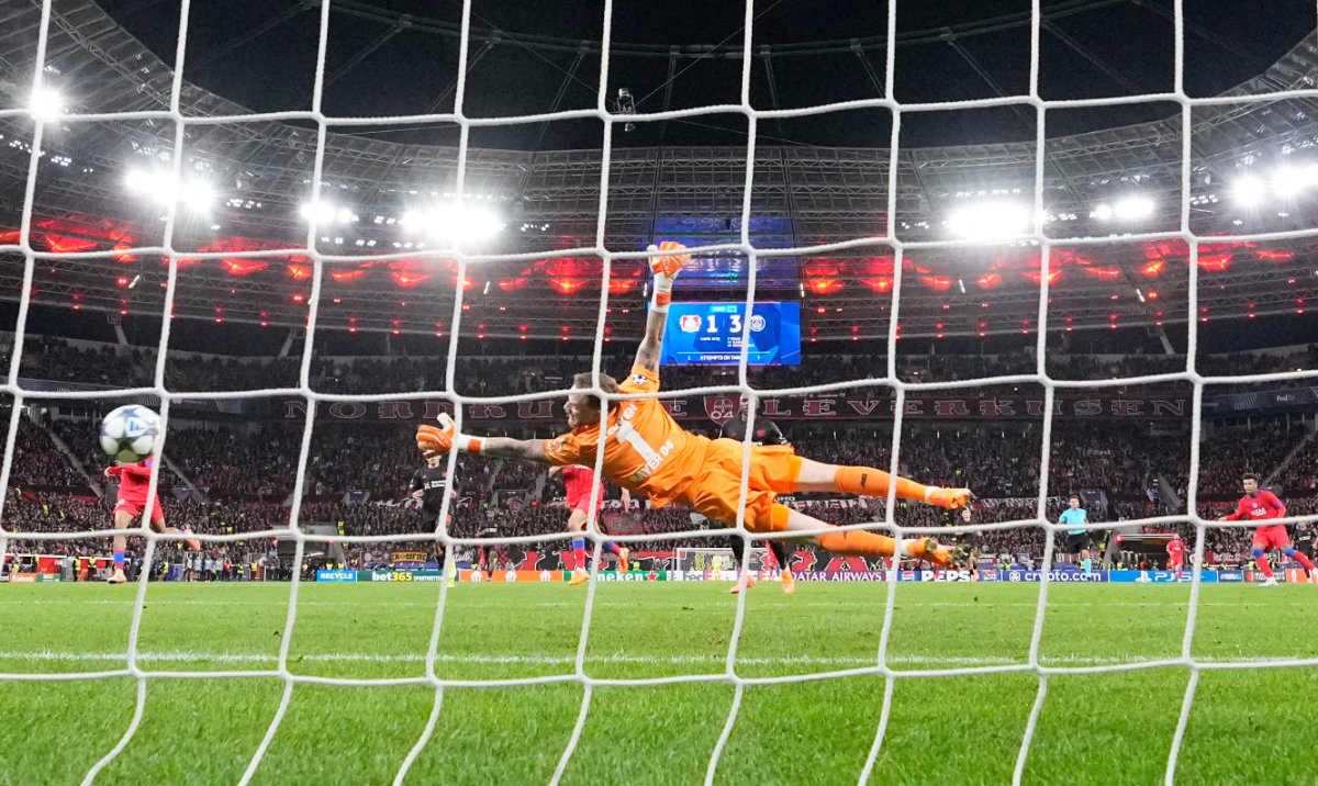 PSG’s Desire Doue scores his side’s fourth goal during a Champions League opening phase football match between Bayer Leverkusen and Paris Saint-Germain in Leverkusen Tuesday. (AP)