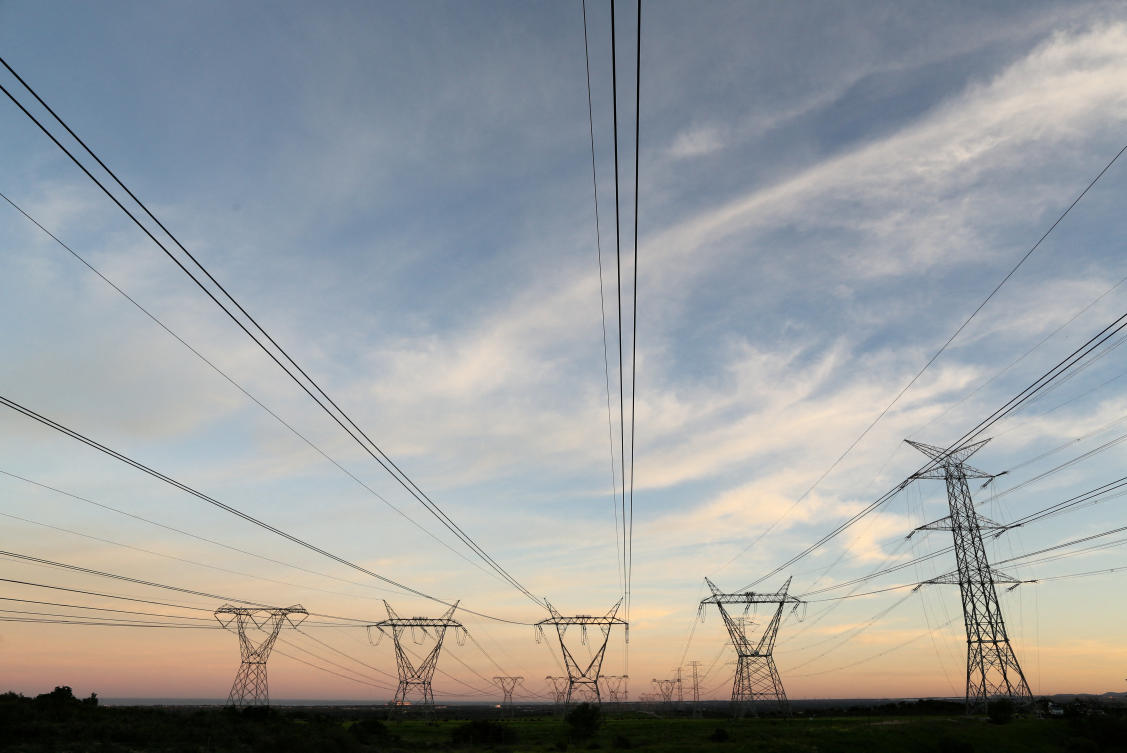 Electricity pylons carrying power from Koeberg nuclear power plant are seen in Cape Town in 2018. (Reuters/File)