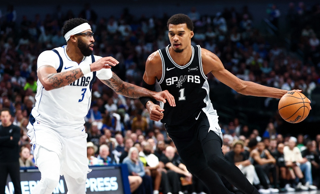 San Antonio Spurs forward Victor Wembanyama drives to the basket as Dallas Mavericks forward Anthony Davis defends during the second half of an NBA game at American Airlines Center Wednesay. (Imagn Images)