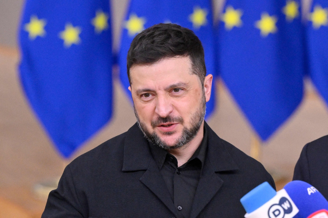 Ukraine's President Volodymyr Zelensky talks to the press as he arrives for a European Council meeting in Brussels, Belgium. (AFP)