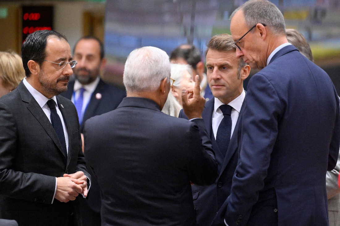 Cyprus' President Nikos Christodoulides, European Council President Antonio Costa, France's President Emmanuel Macron and Germany's Chancellor Friedrich Merz speak after their arrival for a European Council meeting in Belgium. (AFP)