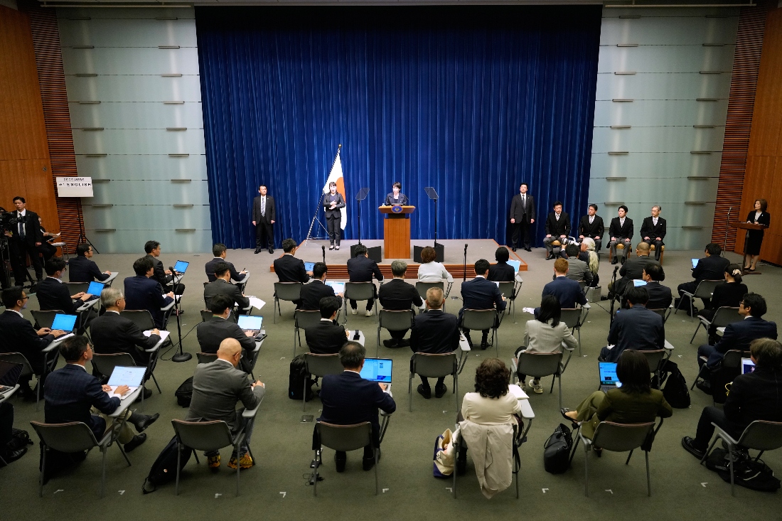 Japan's new Prime Minister Sanae Takaichi, center rear, speaks during a press conference at the prime minister's office in Tokyo, Japan. (AP)
