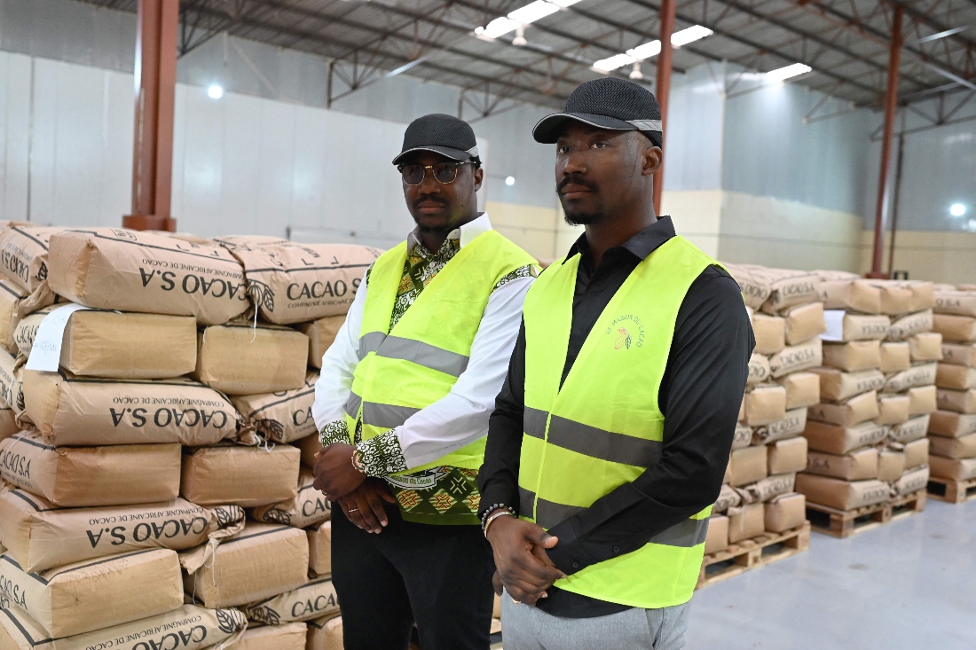 CEOs of Chocolate and Cocoa butter factory Fousseni Diakite and Alahassane Diakite pose for a portrait in Divo, Ivory Coast. (AFP)