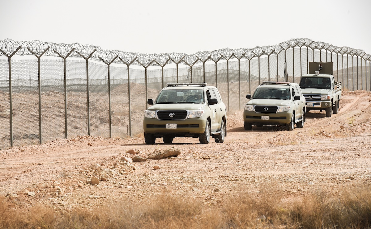 Saudi border guards' vehicles patrol the fence separating Saudi Arabia and Iraq, in the area around Arar city along the Saudi-Iraq border on March 12, 2017. (FILE/AFP)
