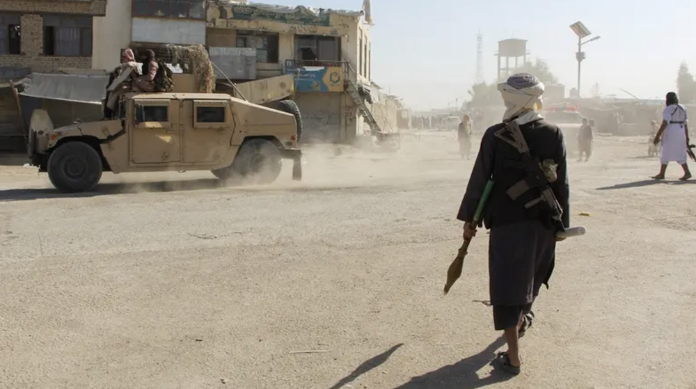 Afghan Taliban fighters patrol near the Afghanistan-Pakistan border in Spin Boldak, Kandahar Province, following exchanges of fire between Pakistani and Afghan forces in Afghanistan, on October 15, 2025. (Reuters)