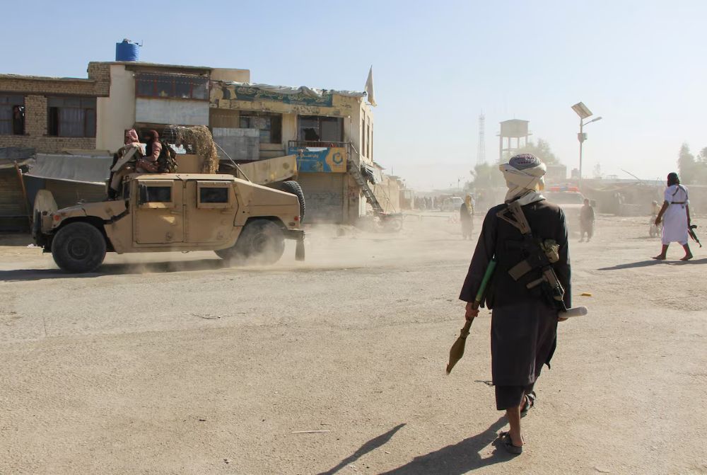 Taliban fighters patrol near the Afghanistan-Pakistan border in Spin Boldak, Kandahar Province, following exchanges of fire between Pakistani and Afghan forces, Oct. 15, 2025. (Reuters)