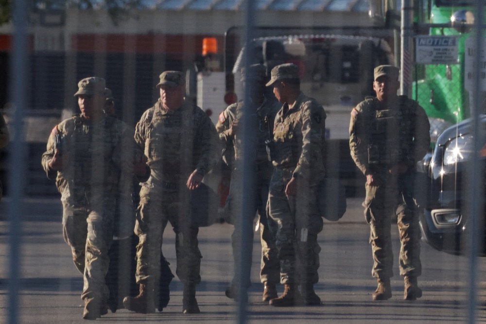 National Guard members walk at the US Immigration and Customs Enforcement’s Broadview facility in Chicago, Illinois. (Reuters)