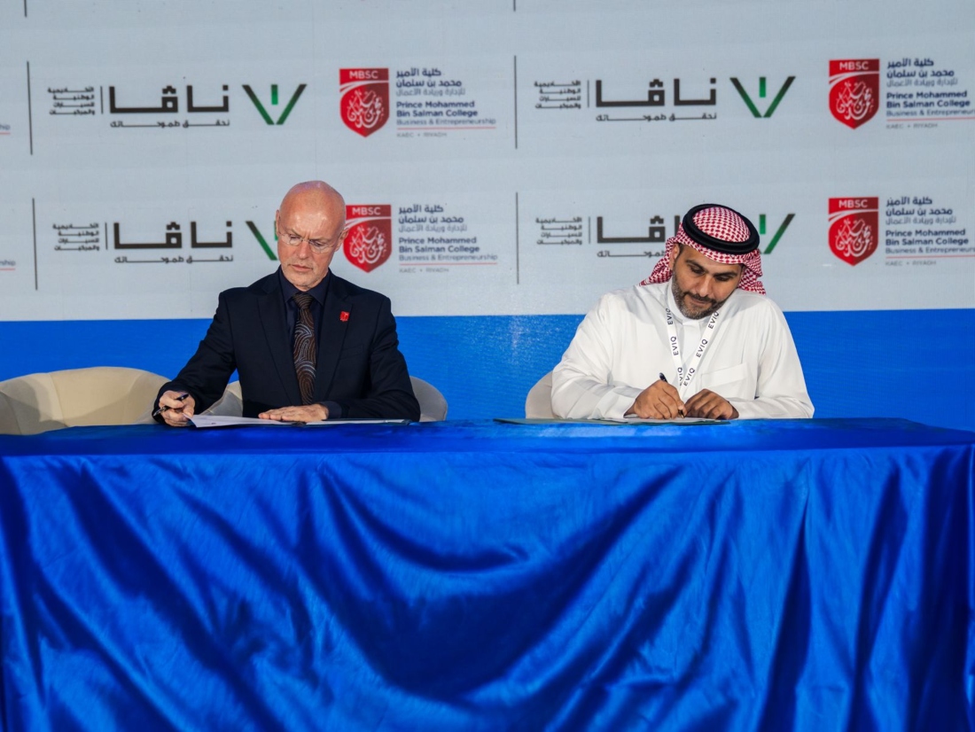 Zeger Degraeve, executive dean of MBSC, and Mohammed Al-Suhaim, managing director of NAVA, signed the deal at the EV Auto Show in Riyadh. (AN Photo/Loai Elkellawi)