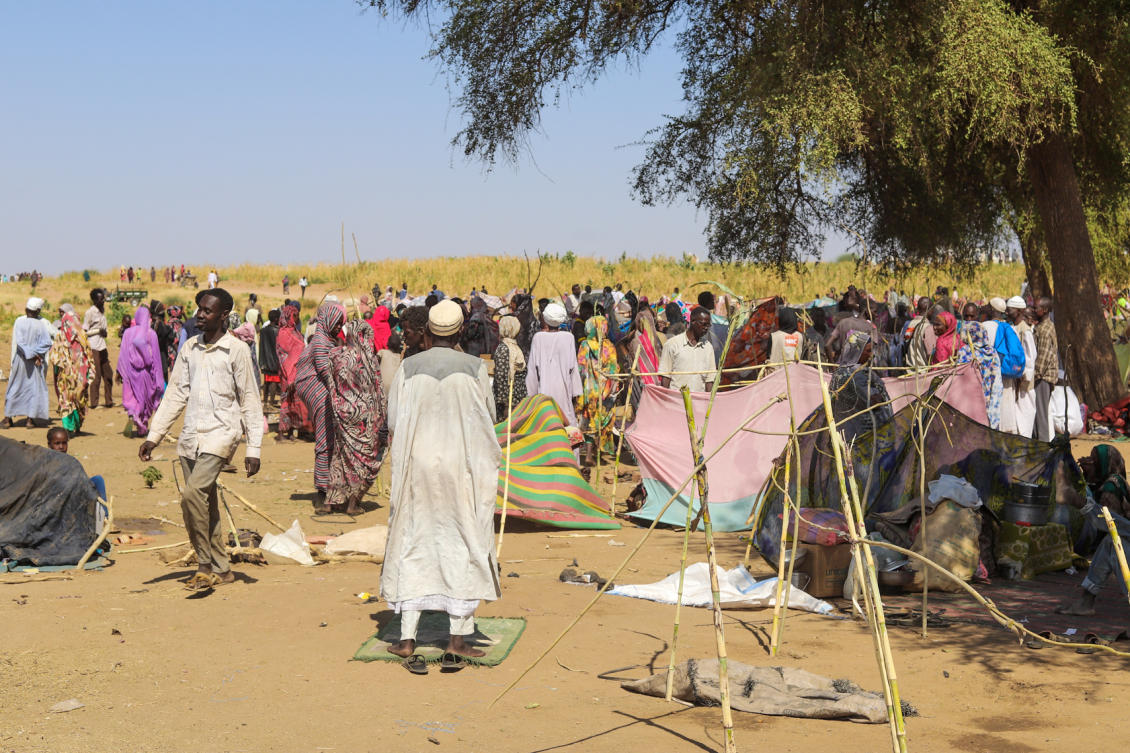 Sudanese who fled El-Fasher city, after Sudan's paramilitary forces killed hundreds of people in the western Darfur region, gather at their camp in Tawila on Wednesday. (AP)