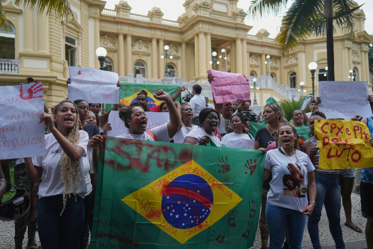 Complexo da Penha favela residents protest in front of the Guanabara Palace against a deadly police operation on alleged drug traffickers of the Comando Vermelho gang, in Rio de Janeiro, on Oct. 29, 2025. (AP Photo)