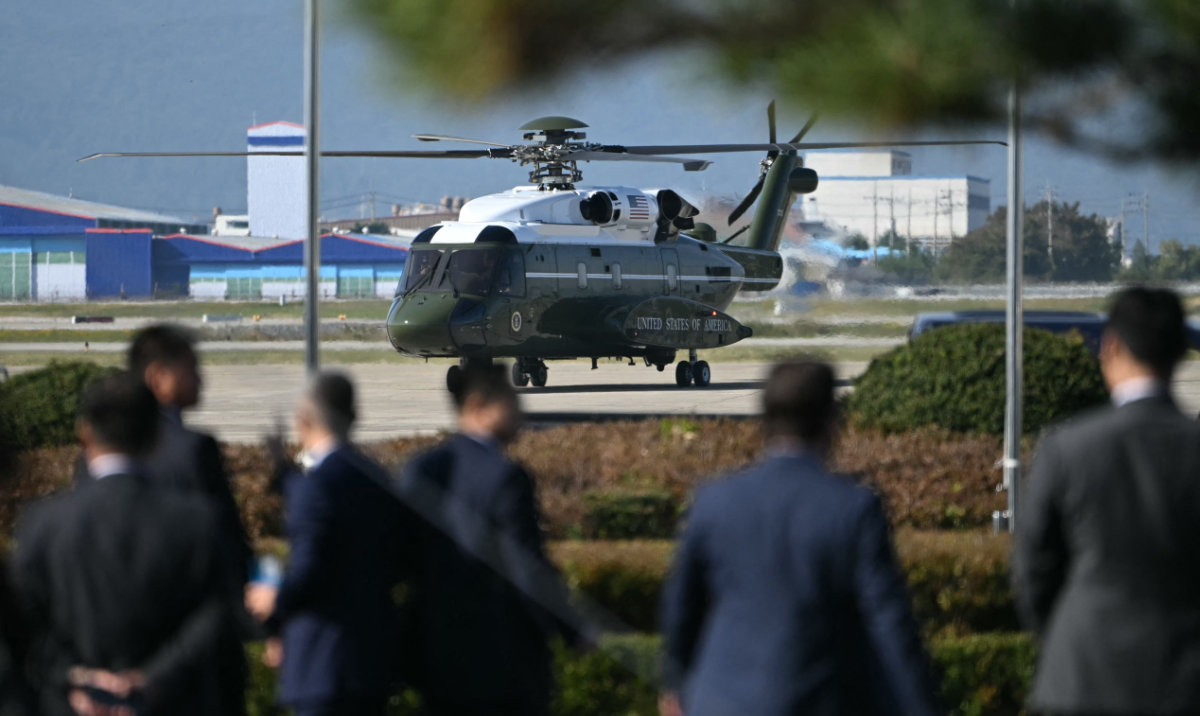 Marine One with US President Donald Trump on board lands at Gimhae International Airport in Busan on October 30, 2025, ahead of his scheduled meeting with China's President Xi Jinping to be held at the airport. (AFP)