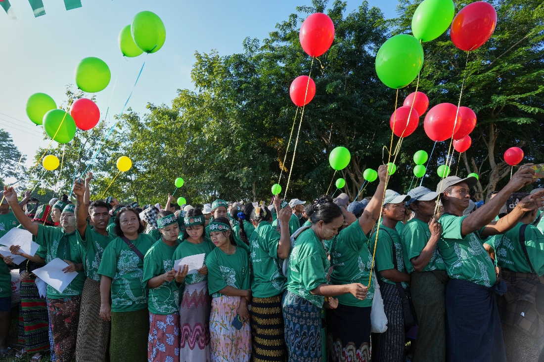 Supporters of the military-backed Union Solidarity and Development Party (USDP) arrive to attend the opening ceremony of the party's poster on the first day of campaign for the upcoming general election, in Naypyitaw, Myanmar. (AP)