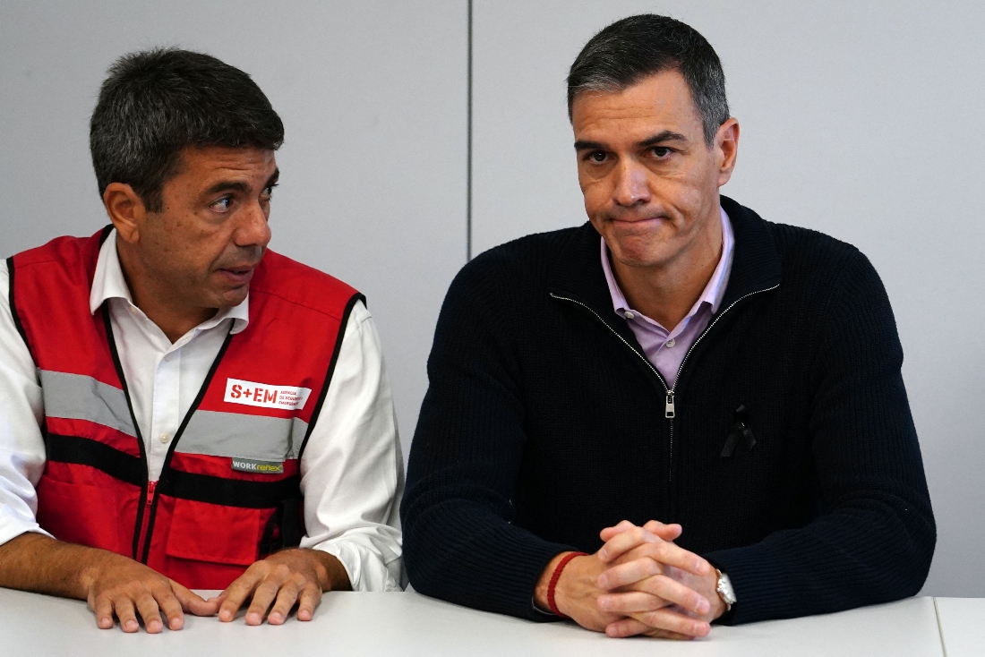 Spanish Prime Minister Pedro Sanchez presides a meeting of the government's crisis committee next to Valencia Regional President Carlos Mazon in L'Eliana, Spain. (AFP)