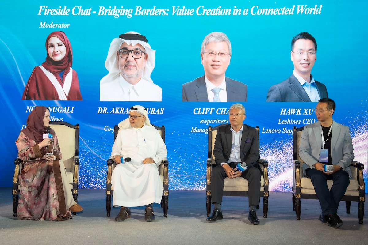 Arab News Deputy Editor-in-Chief Noor Nugali, Aces CEO Akram Aburas, ewpartners managing partner Cliff Chau and Leshines CEO Hawk Xu speak during a panel at ewpartners' China Night in Riyadh on Wednesday. (AN Photo)