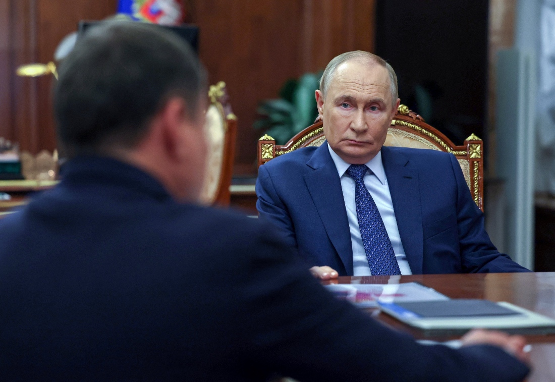 Russian President Vladimir Putin attends a meeting with Chairman of the Board of Rusnano management company Sergei Kulikov in Moscow, Russia. (Reuters)