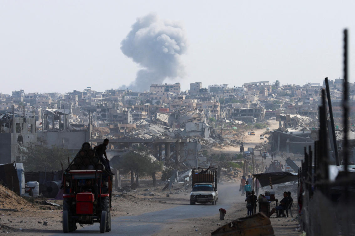 Smoke rises in Khan Younis, southern Gaza Strip, on Thursday as Israel continued its assault on the territory. (Reuters)