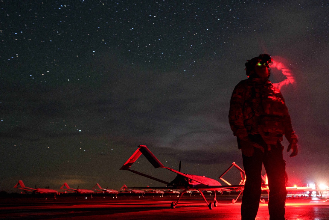 A Ukrainian commander looks though night vision before takeoff long-range drones An-196 Liutyi towards Russia in undisclosed location, Ukraine. (AP)