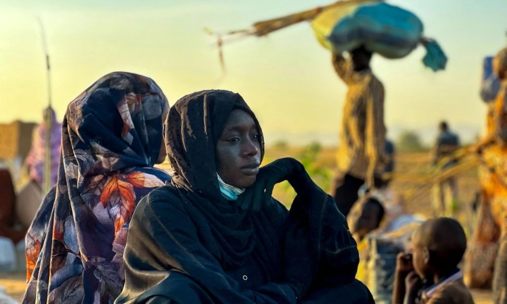 A displaced woman is pictured after fleeing El-Fasher following the city’s fall to the RSF, Tawila, Sudan, Oct. 28, 2025. (AFP)