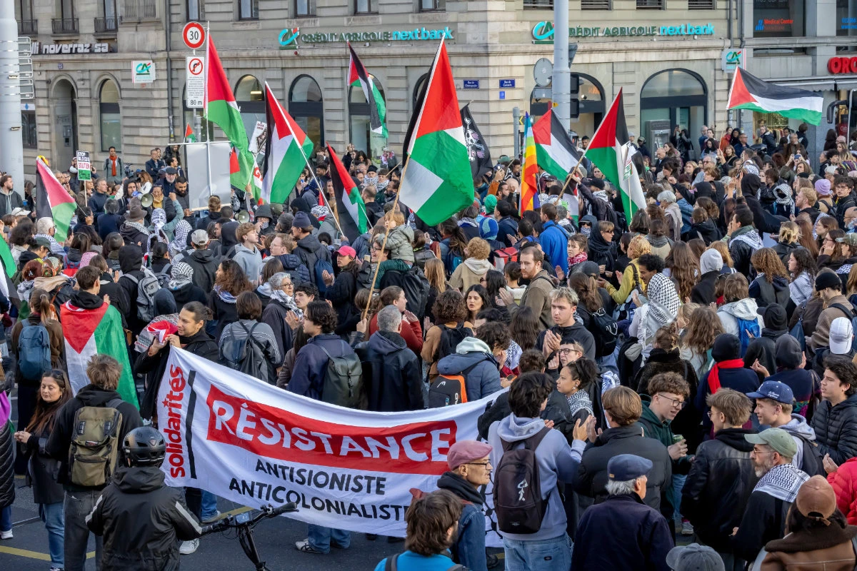 Protesters take part in a rally in support of the Gaza flotilla boats, in Geneva, Switzerland, on Oct. 2, 2025. (Keystone via AP)