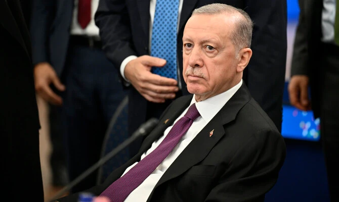 President Recep Tayyip Erdogan urged Syrian Kurds to "complete their integration" with Syria's new government after the announcement of a comprehensive ceasefire, in a transcript shared by his office Wednesday. (AP/File)