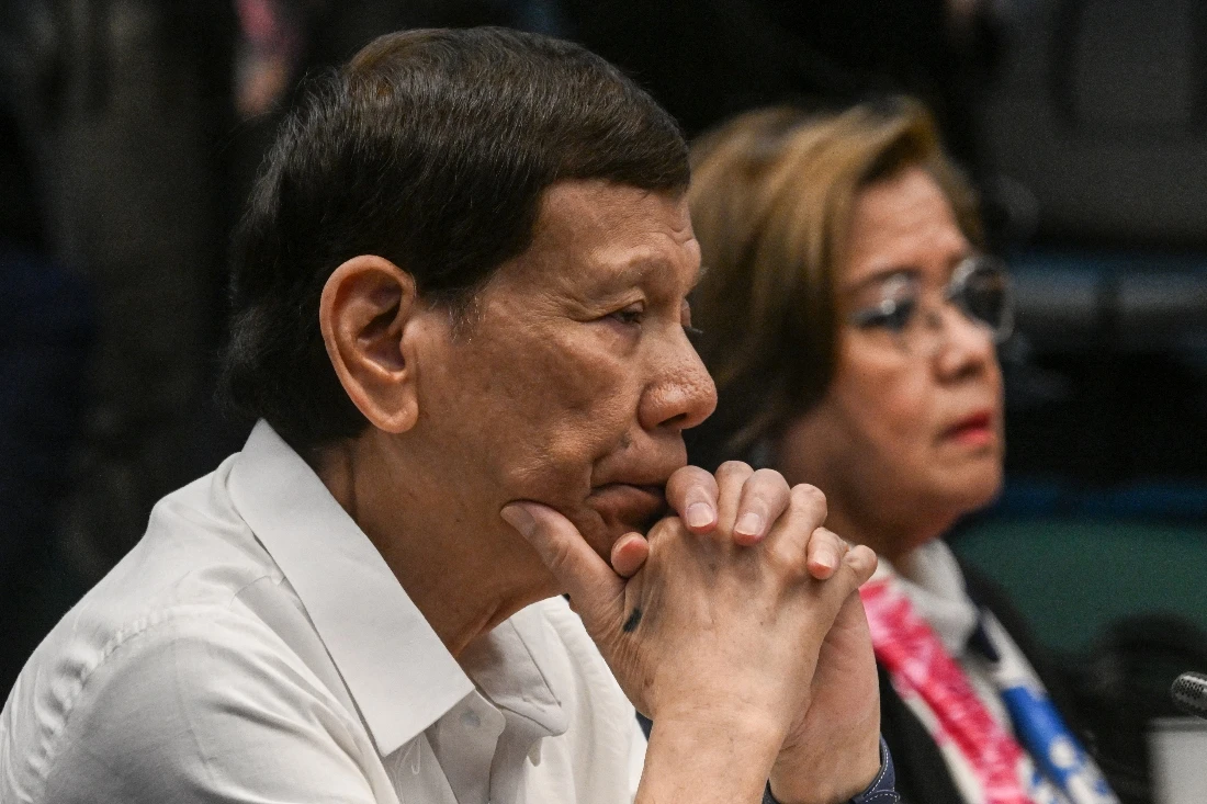 Former Philippine president Rodrigo Duterte and former senator and human rights campaigner Leila de Lima attend a senate probe on the drug war during Duterte's administration, in Manila in 2024. (AFP)