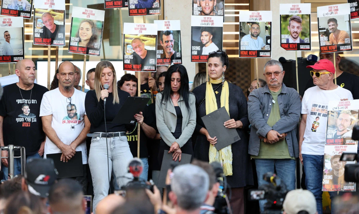 Relatives of Israeli hostages held in the Gaza Strip take part in a gathering in front of the Tel Aviv Museum of Art, known as the "Hostages' Square" in Tel Aviv, on October 11, 2025. (AFP)