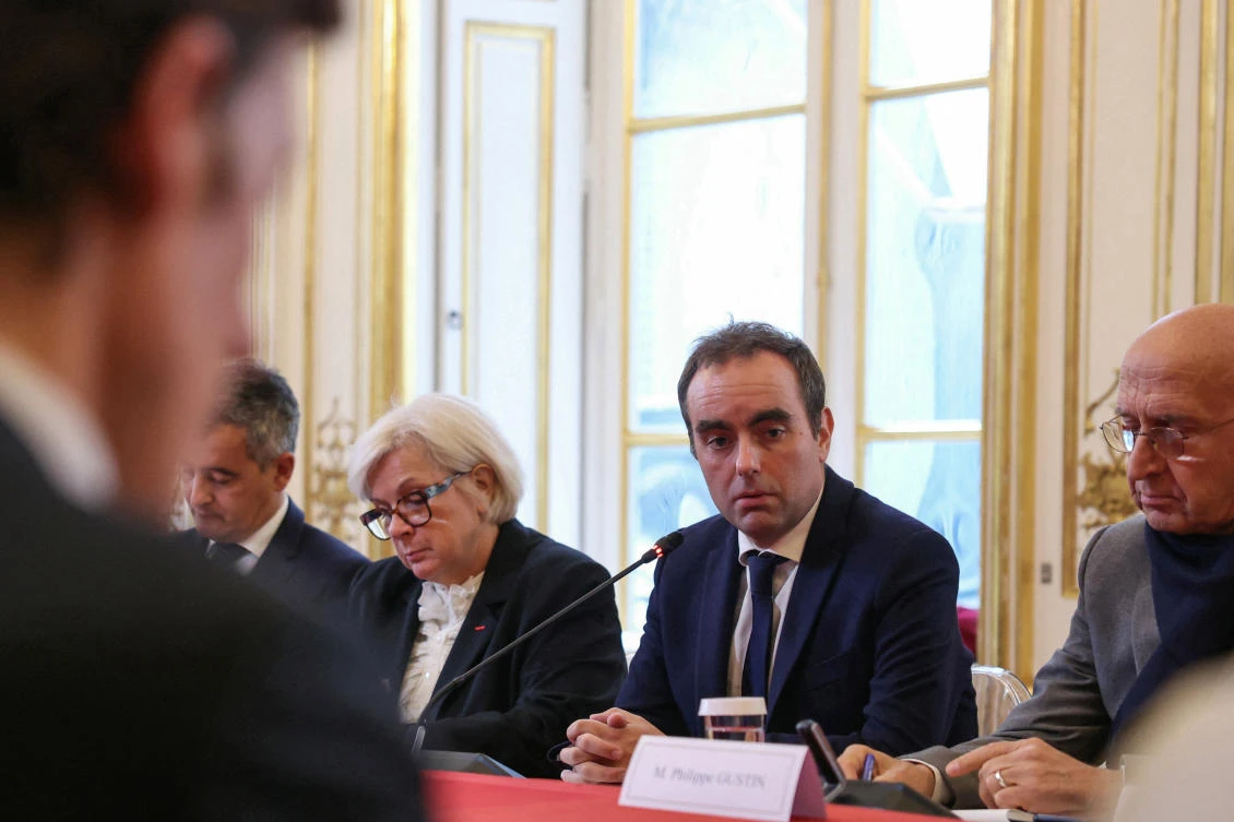 France’s reappointed Prime Minister Sebastien Lecornu, center, delivers a speech during a meeting with the newly-appointed members of his cabinet in Paris on Oct. 13, 2025. (Reuters)