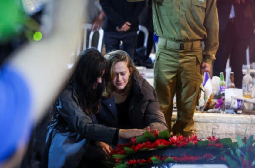 Adina and Shira Perez attend the funeral of their brother, Israeli soldier Daniel Shimon Perez, who was killed during the deadly Oct. 7, 2023 attack by Hamas and whose body was abducted and later returned to Israel as part of a prisoner-hostage swap and ceasefire deal between Israel and Hamas, in Jerusalem, Oct. 15, 2025. (Reuters)